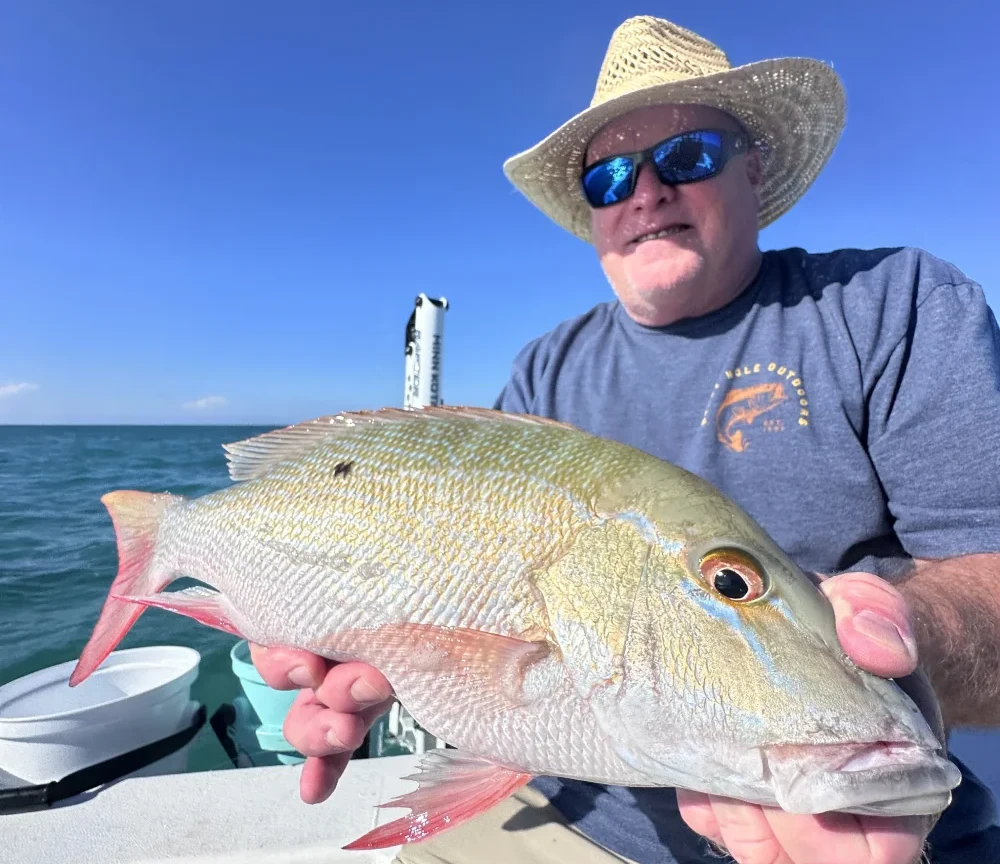 That There is the Face of a MAN Who Already Has a Cooler of Snapper